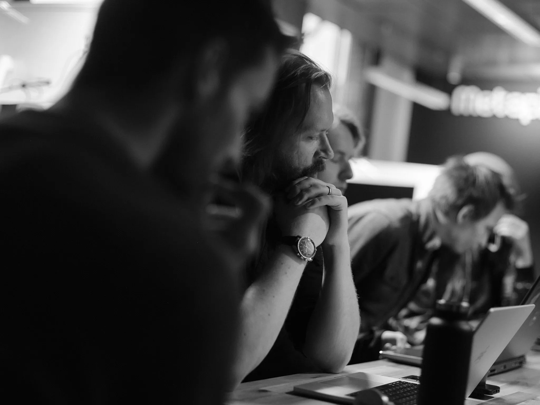 Metaplay team members working together at the office