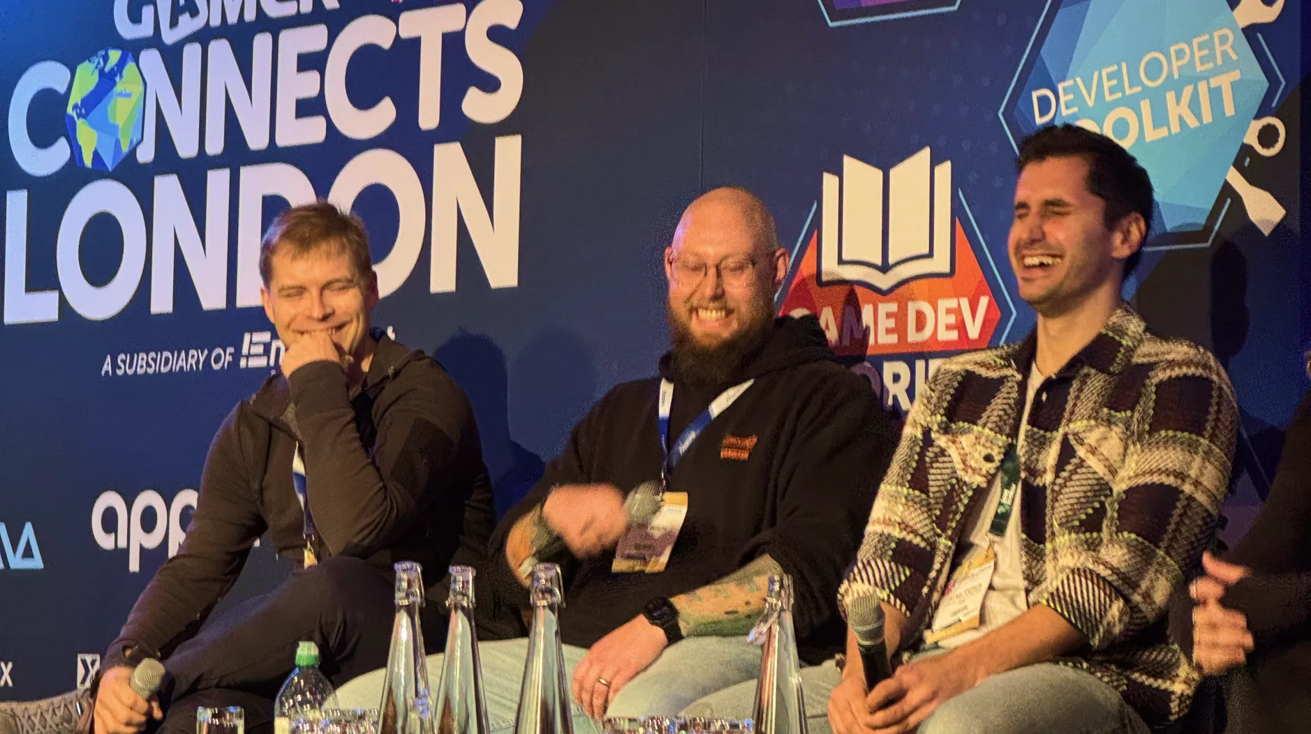 Teemu Haila, John Wright, and Zorbey Cantürk on stage